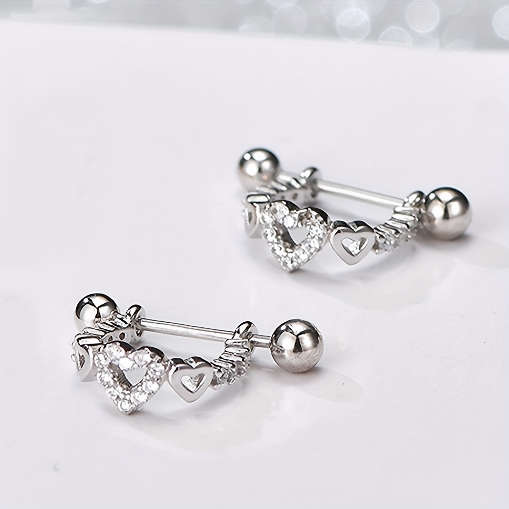 Image of A Pair Of Valentine's Day Exquisite Design Synthetic Synthetic Zirconia Heart Screw-on Ear Bone Studs For Women