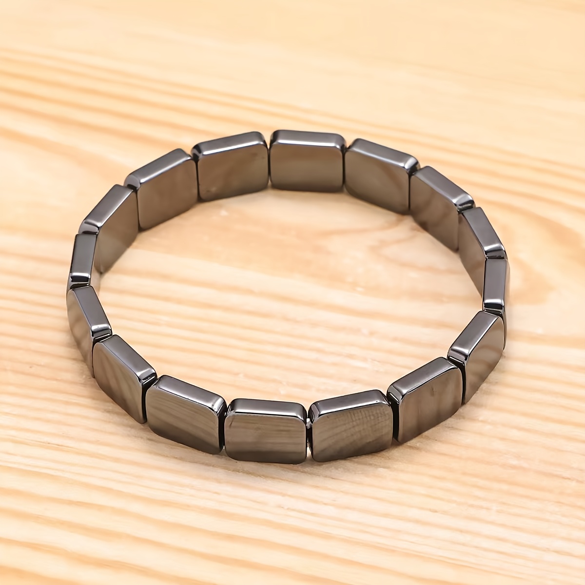 TEMU Fashionable Black Onyx Bracelet With A Silvery-gray . -cut Fit Around The Wrist, Offering A Simple Yet Textured Design. Its Touch Is Warm And