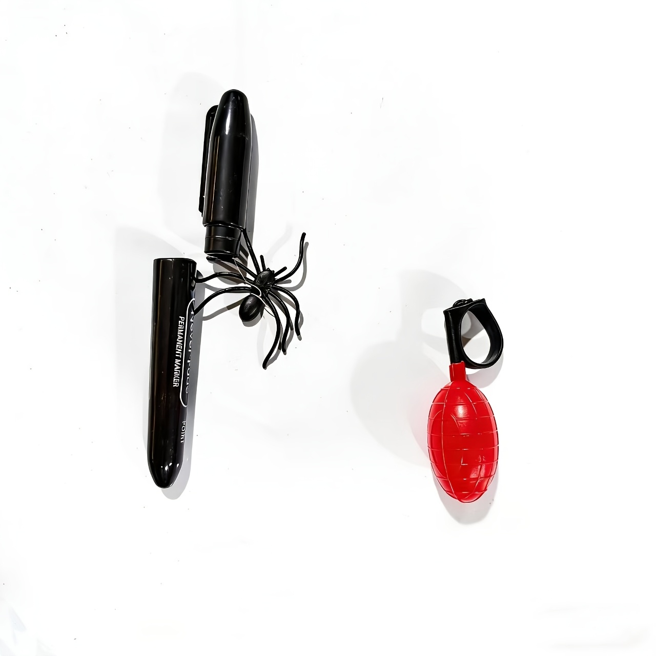 item picture invisible pen   spiders   spoof props give away a water spray ring