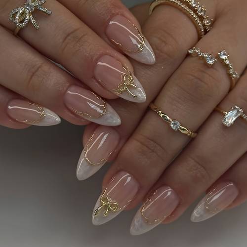24pcs white pointed nails medium almond press on gradient nails y2k style with golden 3d bow and glitter irregular line decoration shiny and vibrant end removable design style full coverage suitable for womens daily wear valentines nails