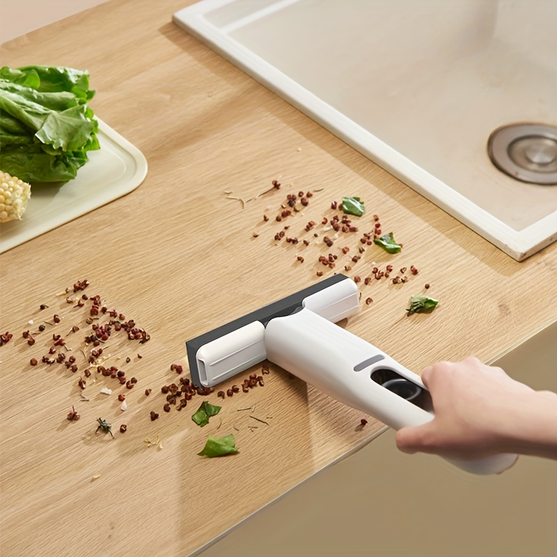 Handheld Multifunctional Cleaner, Equipped with Replaceable Mop Heads And a Hook. The Rotating Mop Head Allows for Easy And Forceful Cleaning of Gaps And Corners in Sinks, Pet Urine, And Desktop Debris. A Portable Marine Cleaning Mop/Tool.