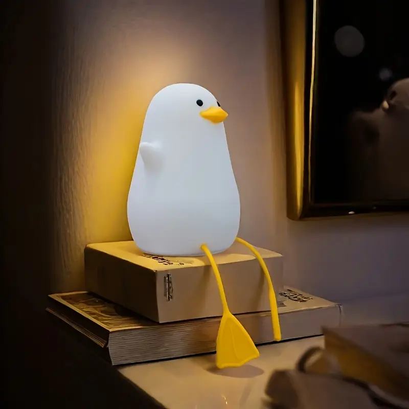 a yellow duck night light a fun yellow that flaps its wings a phone holder a rechargeable night lamp suitable for bedrooms and living rooms a quirky home decoration birthday and easter gifts Product details 4