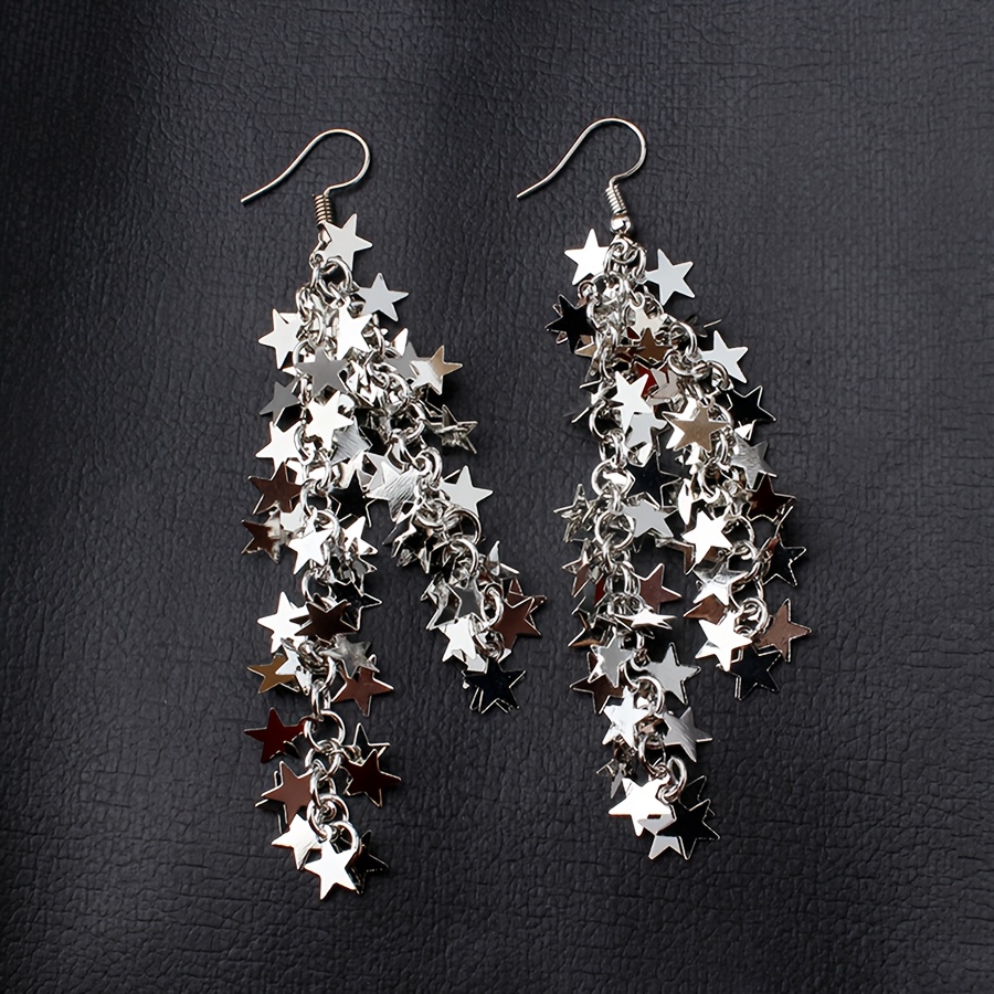 

A Pair Of New Dazzling Galaxy Star Waterfall Tassel Exaggerated Earrings With A High Sense Of Luxury, Featuring Golden Sequins And A Five-pointed Star Design, Popular Among Women.