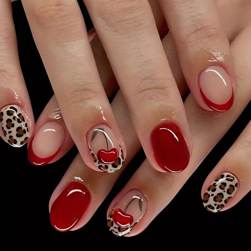 Image of Short Oval Shape Press On Nails Red French And French Leopard Print Rubber Coated Cherry Leopard Print Design Full Cover Nails Suitable For Women And 24pcs