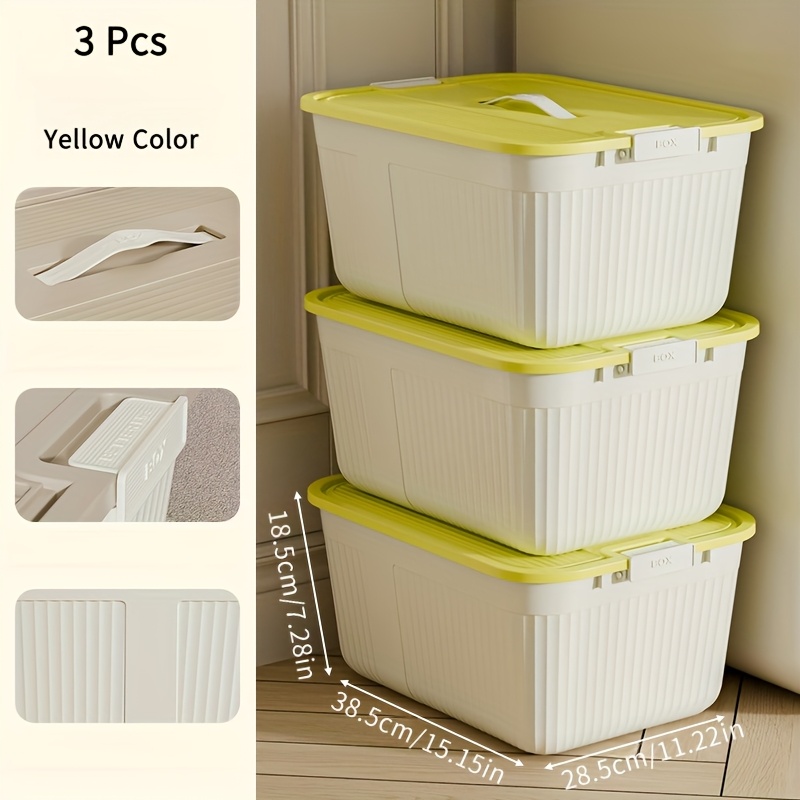 three lidded plastic storage boxes stackable organizing containers with snap seals and handles suitable for home storage for in closets kitchens bedrooms and living rooms in cream yellow measuring 38 5 28 5 18 5cm Product details 0