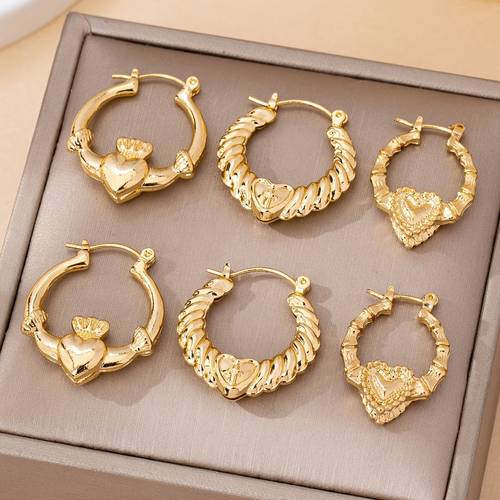 a set of six stylish and elegant metal golden hollow heart shaped earrings with a head and bamboo joint design womens daily wear parties festive occasions and gifting