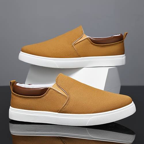 mens solid color casual slip on skate shoes canvas upper breathable non slip lace up versatile footwear suitable for outdoor leisure street style spring summer autumn winter daily casual outdoor use pull on low top canvas fabric lining pvc sole fabric insole round toe