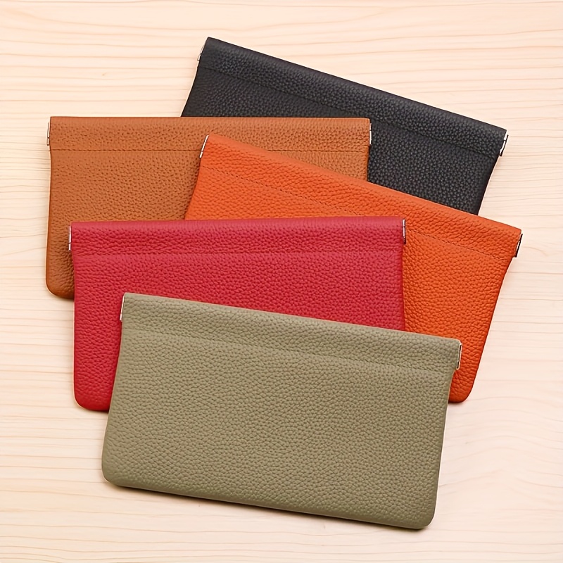 

A Minimalist Style Long Wallet With Pattern, High-quality, Featuring Compartments For Passport And License, A Headphone Cable Storage Bag, A Makeup Pouch, A Coin Purse, And A Small Wallet.