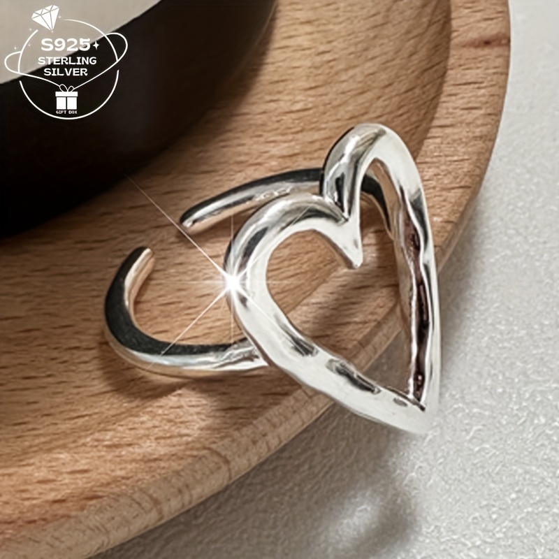 

1pc925 Silver, Hollowed Out Heart-shaped Adjustable Ring For Ladies. Suitable For Pairing With All Clothing And Round. Valentine's Day Gift.