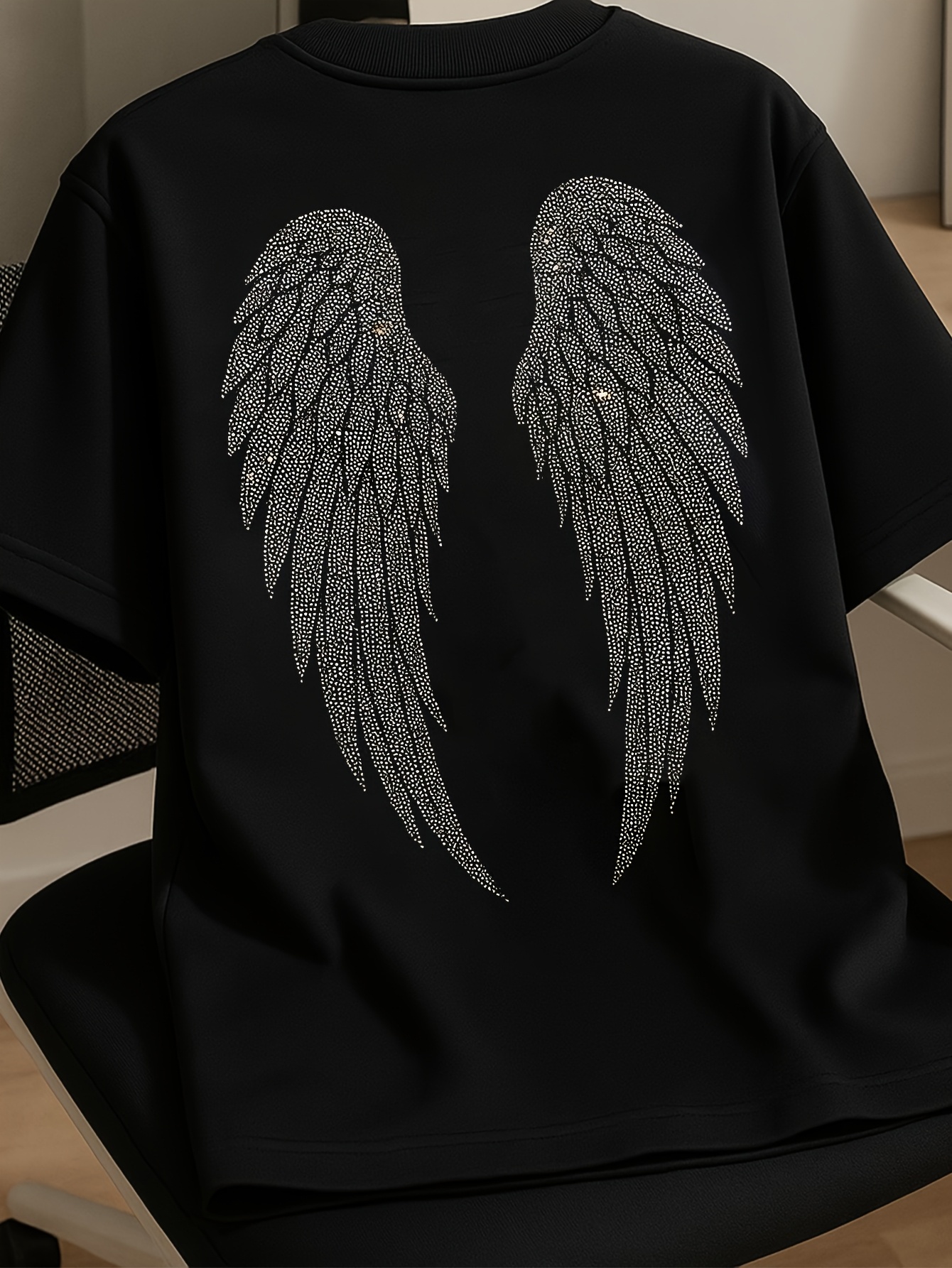 angel wings shirt sold on Temu United States