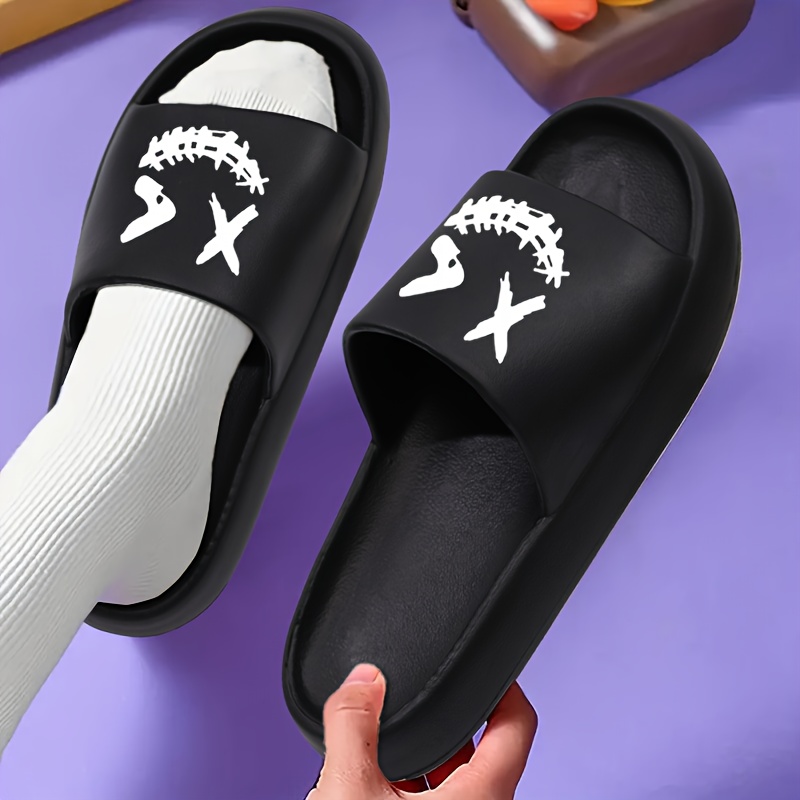 OURANNI Boys' & Girls' Lightweight EVA Slippers - Cartoon Clown Design, Non-Slip Indoor/Outdoor Sandals for All Seasons, Beach & Casual Wear, Black with White Clown Faces, Comfortable Open-Toe Slippers, Beach Footwear, Playful Footwear, Durable Footwear, For Teenager, For Teenager