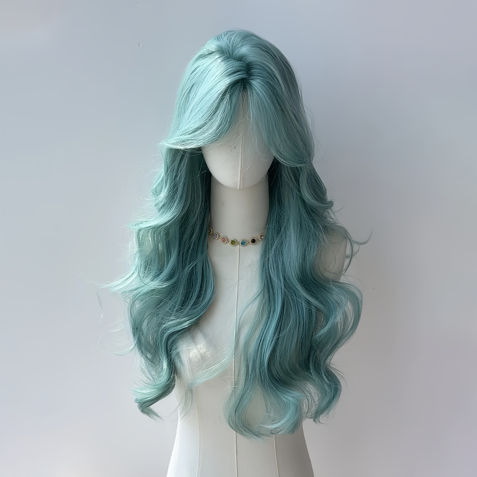 Image of -inch Wig For Women In Lake Blue, Featuring -shaped Bangs And Large Waves. It Has Long, Curly Hair Fluffy And For Everyday And Photos