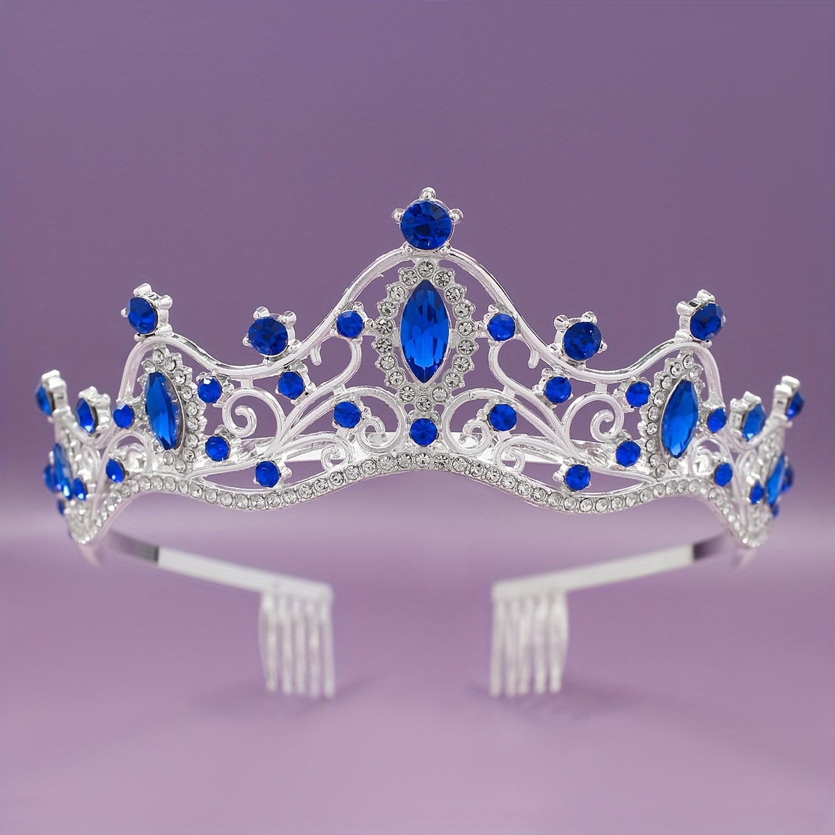 

A , With Silvery Crown And Sparkling Rhinestones, A Wedding Decoration.