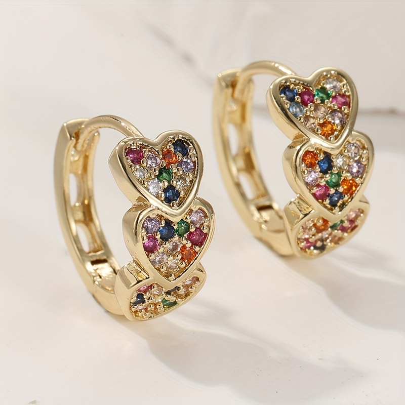 TEMU Orecchini a da donna , caratterizzati da un lavorazione in rame con design a cuore intagliato e di zirconi cubici multicolore
