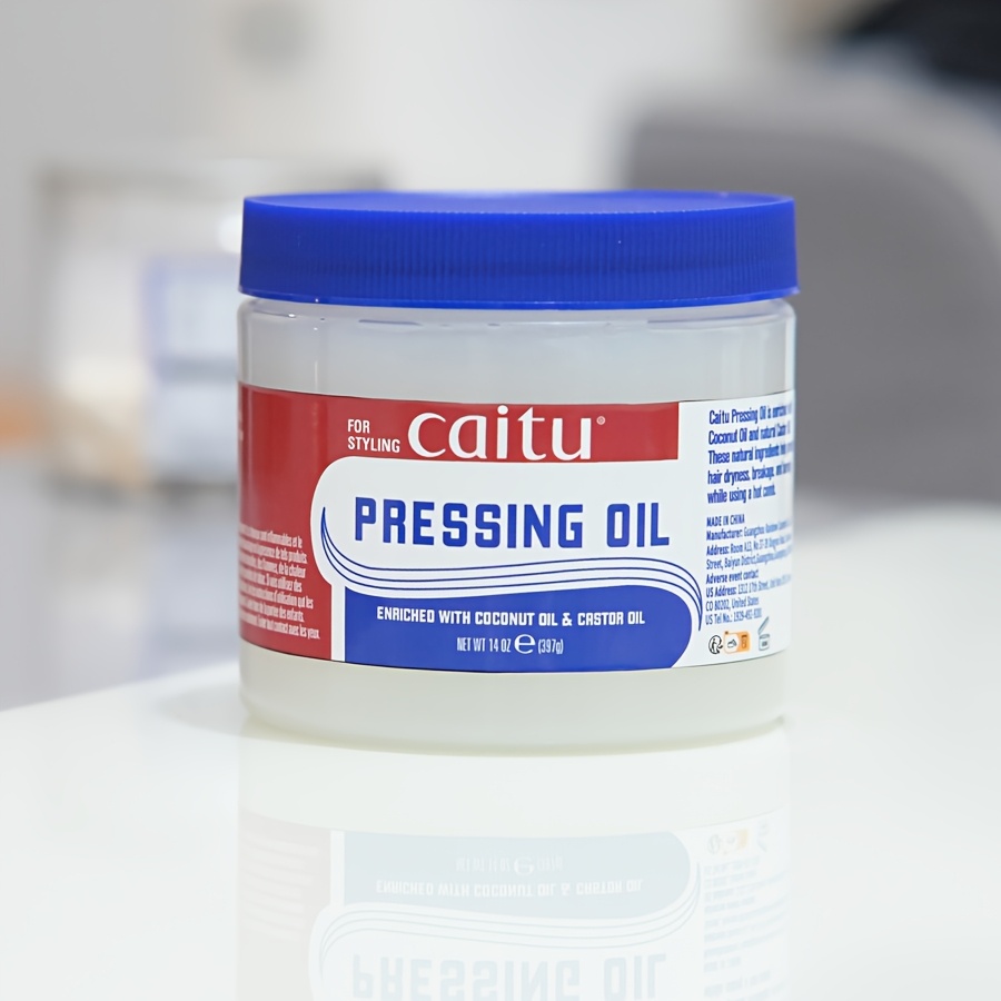 Image of Pressing Oil For Hair-heat Protection, Prevent Hair , Breakage, And Burning, Enriched With Coconut Oil & Castor Oil, Enhances Hair Strength, Adds Moisture, , Adds Shine, Ideal For Use With A Hot Comb.
