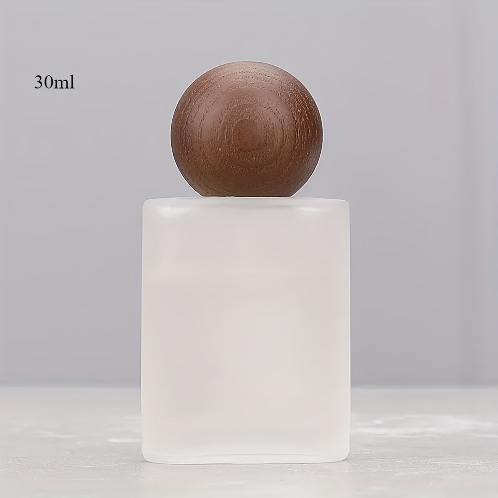E-shop Eine hochwertige, mattierte Sprühflasche aus Glas für Parfüm, wiederaufzufüllen und für unterwegs