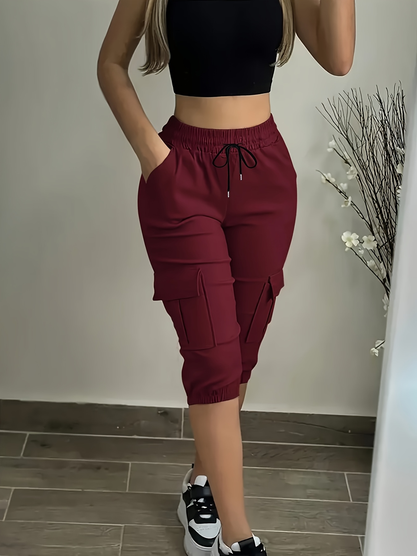 womens solid color casual sporty   eighth pants with side cargo pockets and   stretch fabric