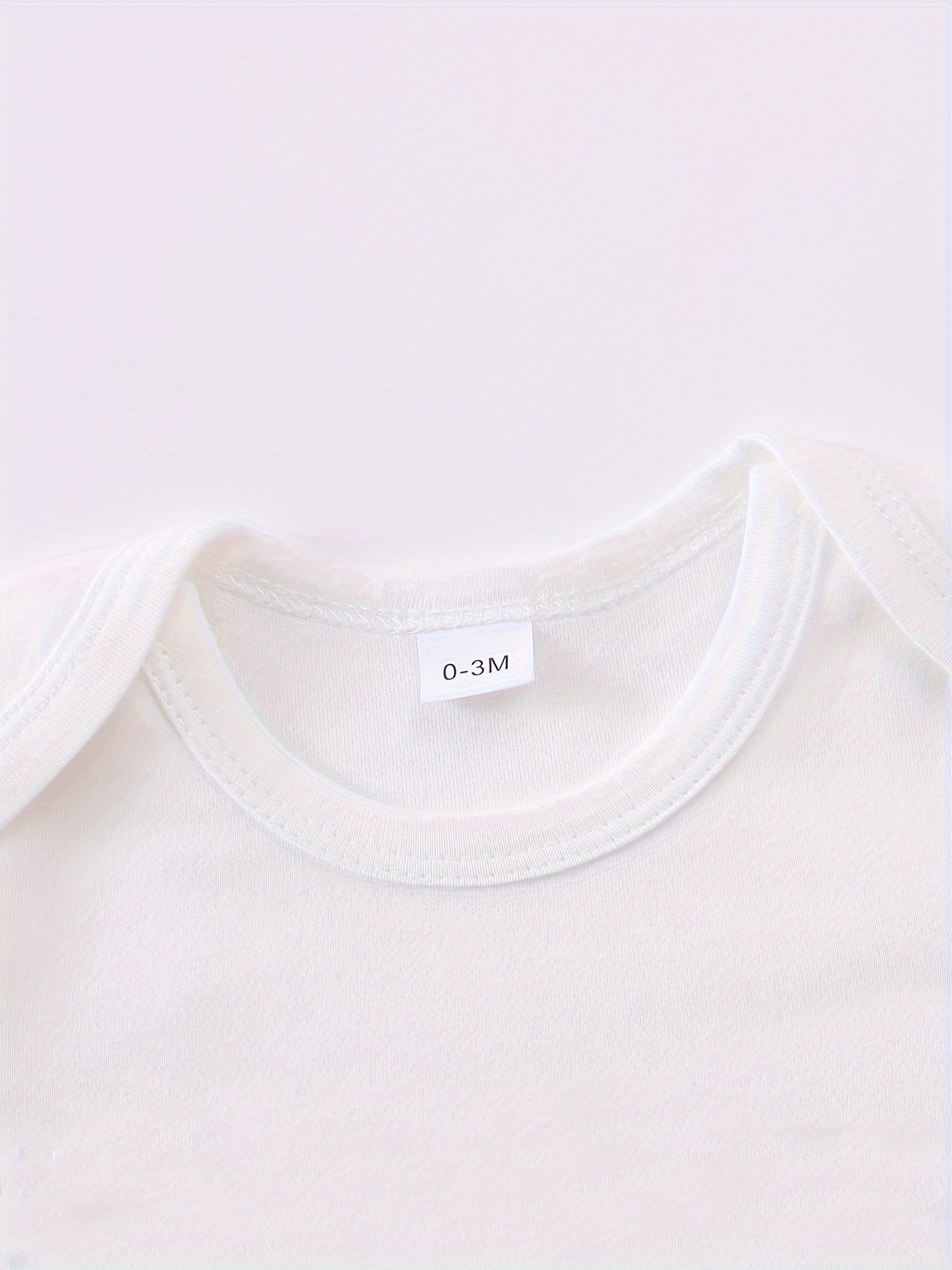 Pure witte driedelige set voor baby's