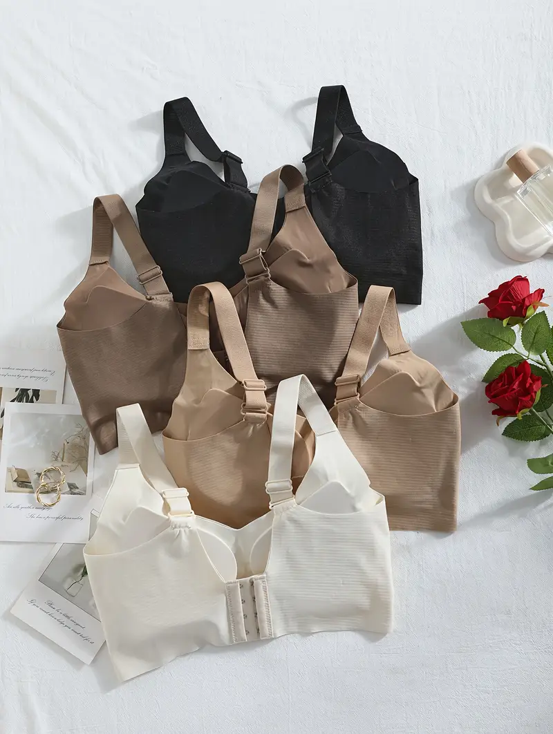 4pcs womens wire free soft bralettes medium support wide strap strapless bras with non removable padding elegant solid colors white beige everyday beige friendly fabric machine washable no underwire for sensitive light beige casual attire light exercise seamless design lifestyle Product details 1