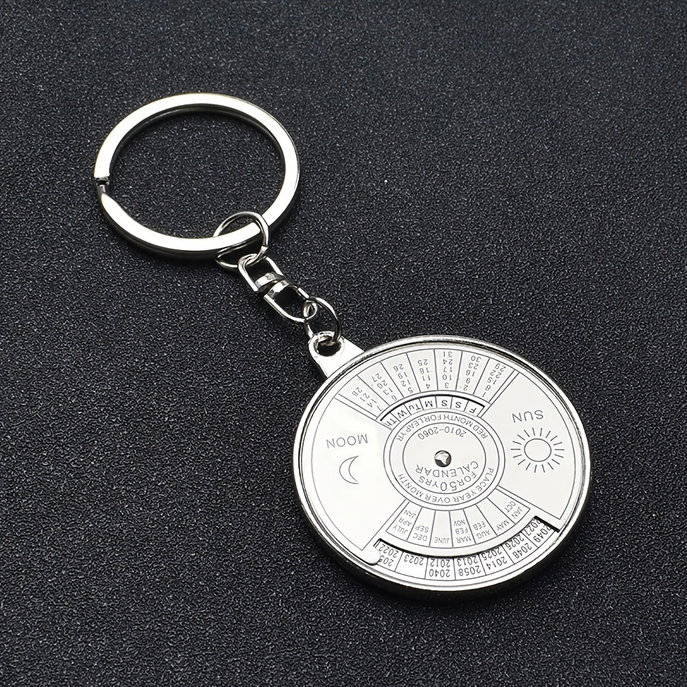 TEMU A Creative And Stylish Engraved Letter Keychain Featuring A Perpetual Calendar With Sun And Patterns. This Trendy And Practical Accessory Is And