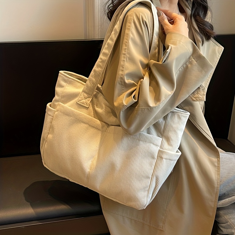 

Sac Fourre-Tout Chic en Velours pour Femme - Spacieux & Élégant avec Plusieurs Poches, Bandoulière , Fermeture Éclair | Disponible en Marron Foncé, , Blanc, Vert, Noir | pour un