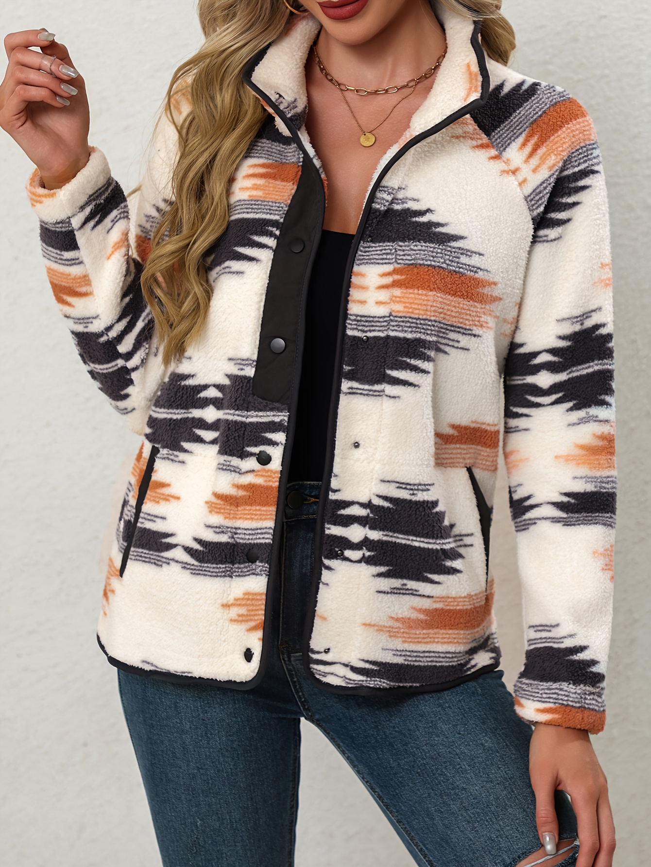 Front view of the women's Aztec pattern button-front coat