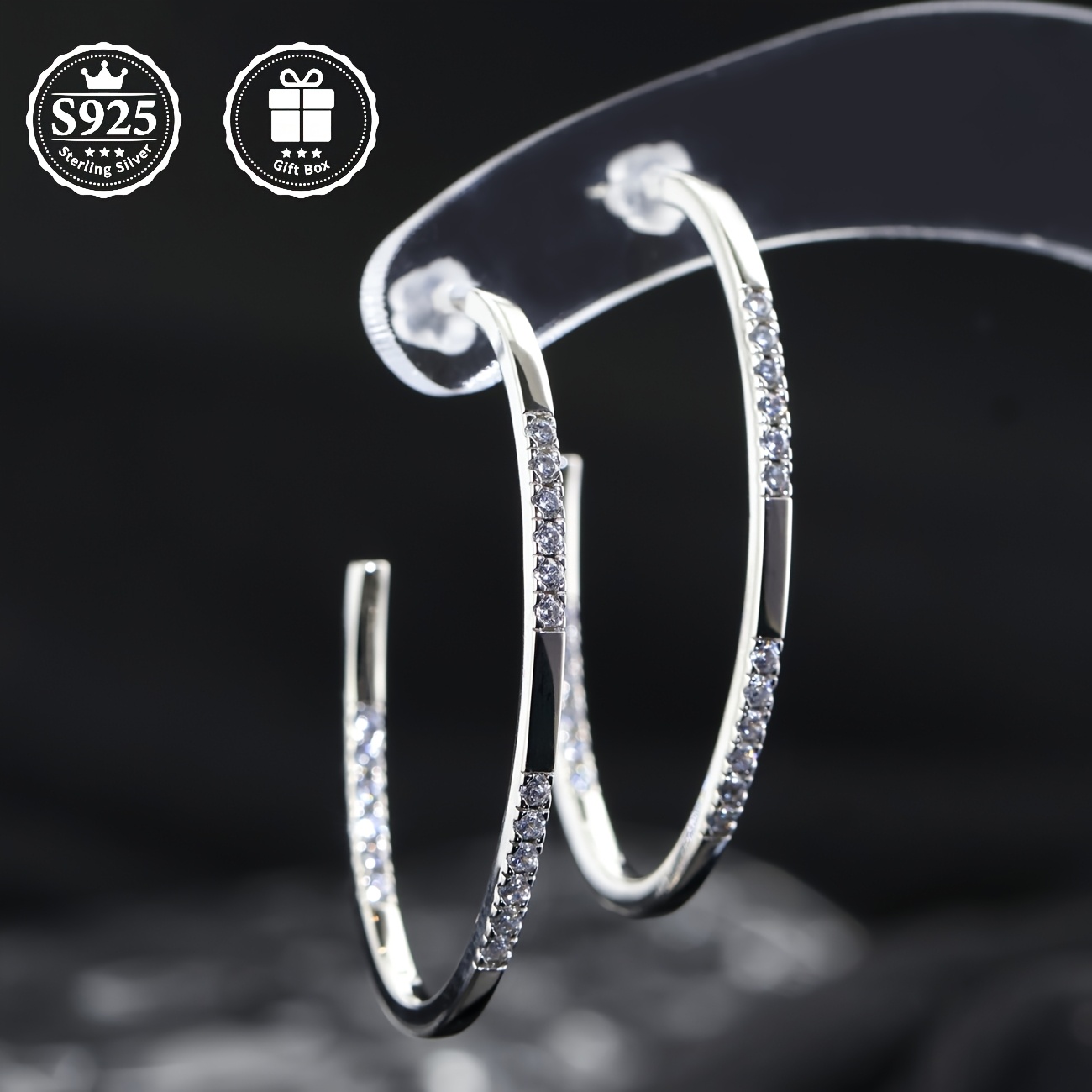 a pair of stud earrings with moissanite moissanite inlaid  925 silver material   are fashionable and elegant stud earrings for ladies which     daily or   as a   present for family   friends or lovers Product details 4