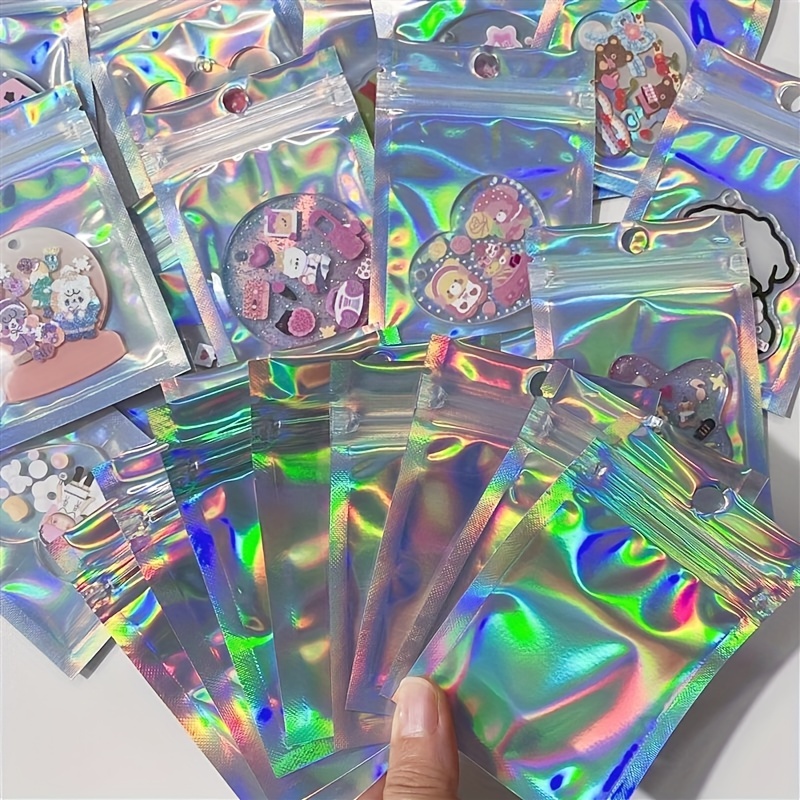 

50/100pcs Transparent Laser Holographic Zipper Storage Bags, Plastic Jewelry Pouches Perfect For Earrings, Necklaces, Bracelets, Rings & Small Business Items