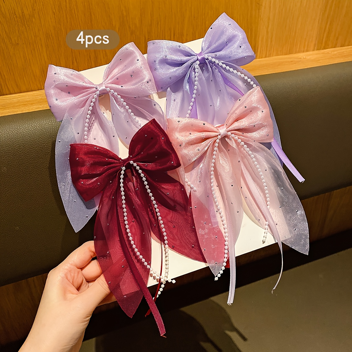 

4 Sweet-style Bow Hair Clips