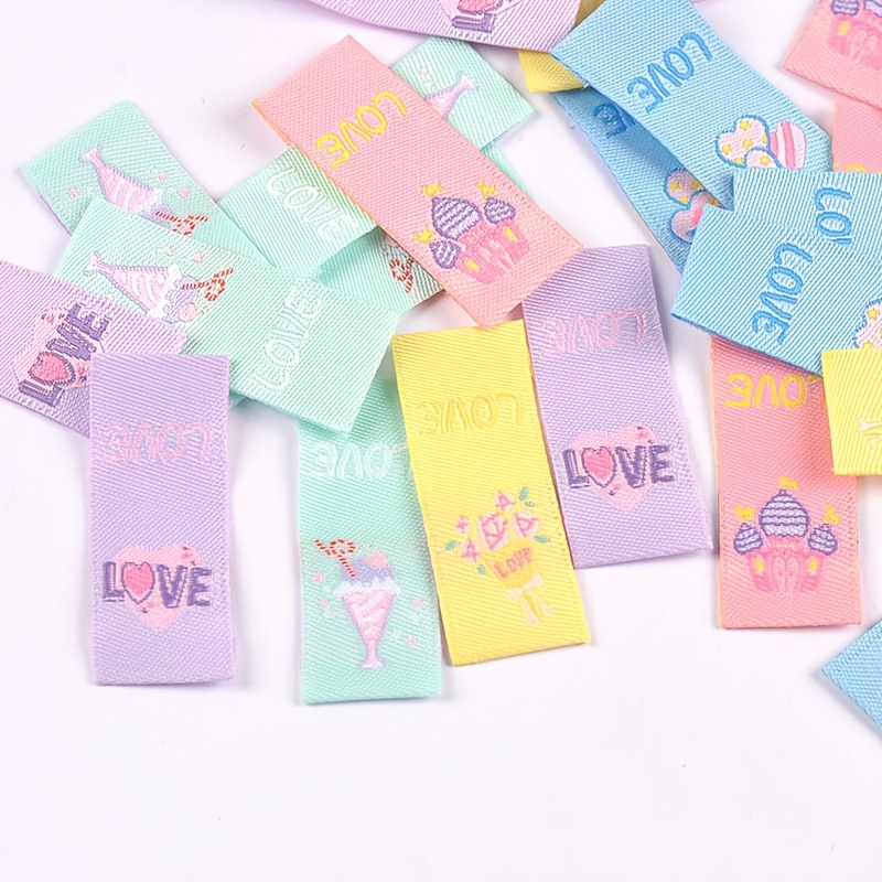 Image of 50pcs 3.8 X 1.5cm Colored Embroidered Tags Clothing Sewing Additions Washable Care Cloth Label Handmade Backpack Clothes Decoration Knitting Supplies