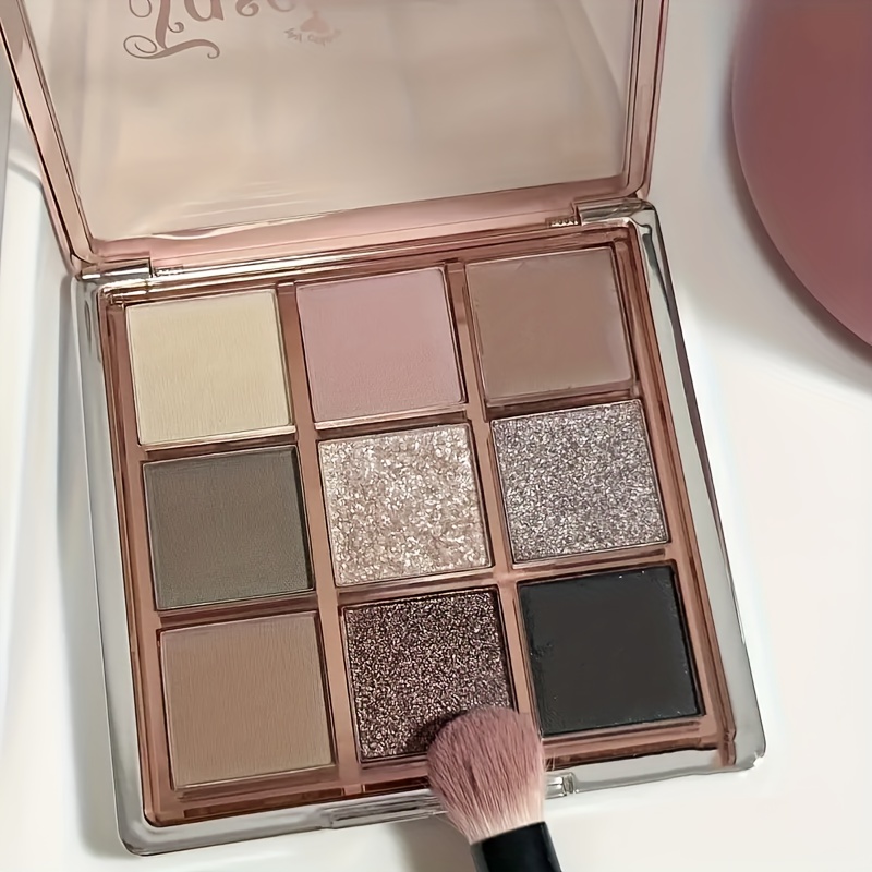 9-color eyeshadow palette - smoky grey, brown and pink tones, mousse eyeshadow, matte and shimmery finishes, fine Shimmery glitter, low saturation all-in-one palette with matte earthy tones, fine powder texture that doesn't fly off