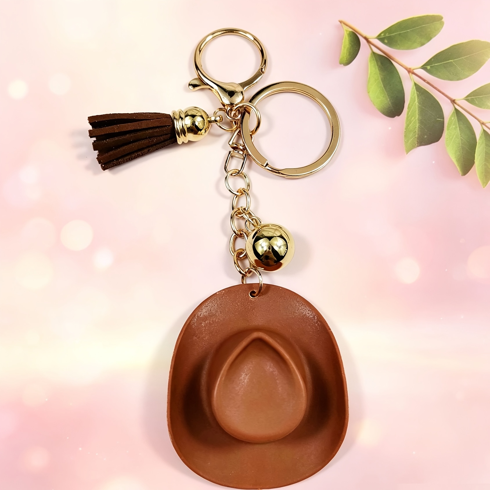 TEMU Un porte-clés chapeau de cowboy avec des pompons et des clochettes, un breloque de sac à dos adaptée pour Noël, Halloween et autres cadeaux de