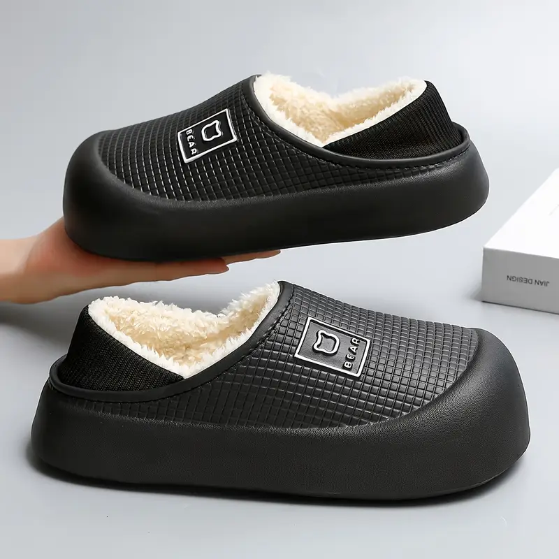 womens winter 2025 new arrival elegant slip on slippers with thick plush fleece lining warm cushioned insole black hand clean shoes cozy indoor footwear textured strap detail durable footwear construction Product details 1