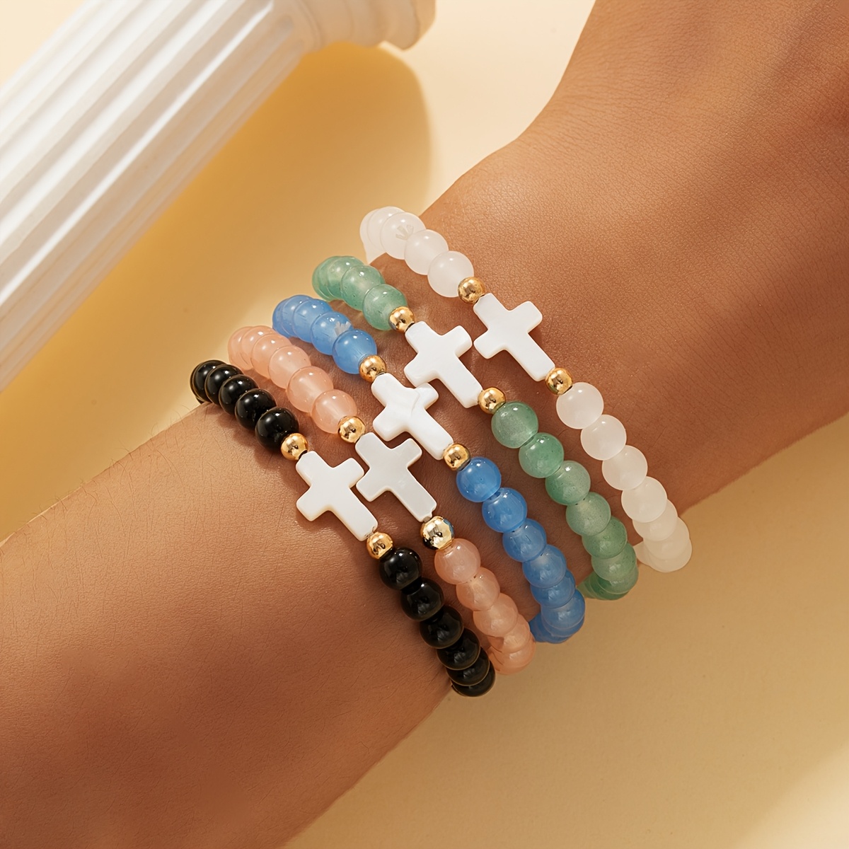 Image of A Set Of 5 Classic And Elegant Minimalist Colorful Glass Bead Cross Bracelets, With Copper Beads, Perfect For Women And Summer. Christian Religious Symbol Additions For For Everyday Wear Or