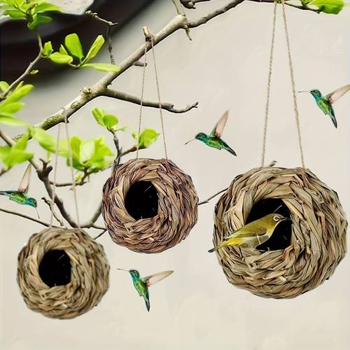 a simulated outdoor garden spherical bird nest made of grass