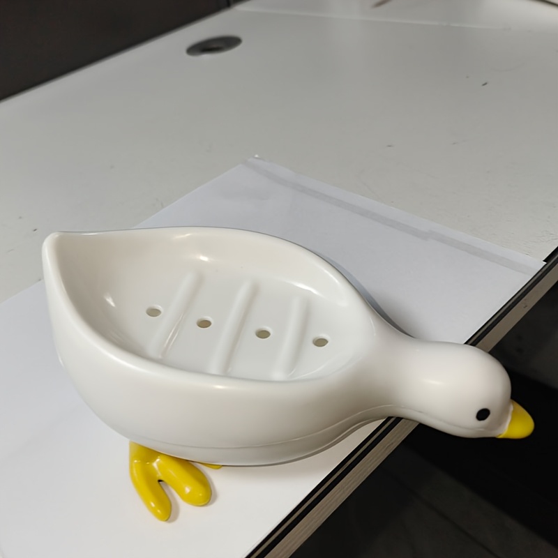 

1pc Porte-savon Canard à vidange automatique - Accessoire de salle de bain en de feuille en plastique pour un rangement facile