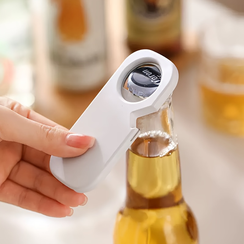 a multifunctional that serves as a magnetic bottle opener can opener and lever for beer cans combining style and  
