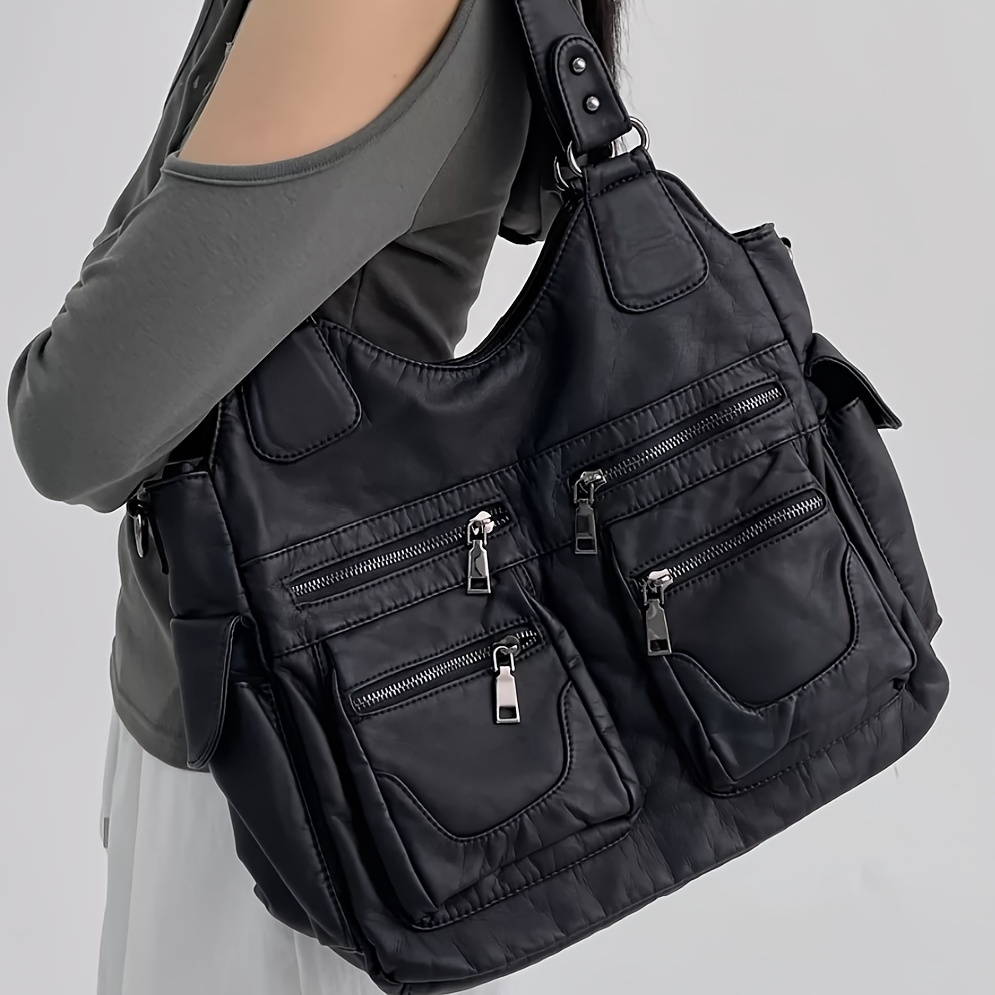 vintage inspired black synthetic synthetic leather tote bag