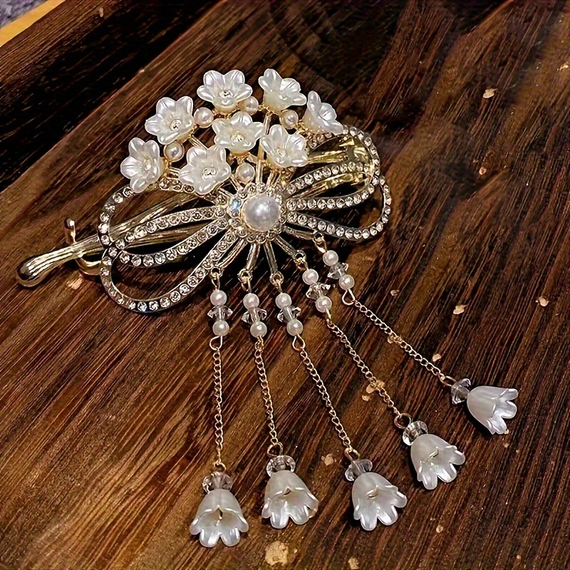 

Elegant Vintage Alloy Hair Clip With , Pearls & Rhinestones - Golden- With Tassels & Bow Accents, Ideal For Thanksgiving &