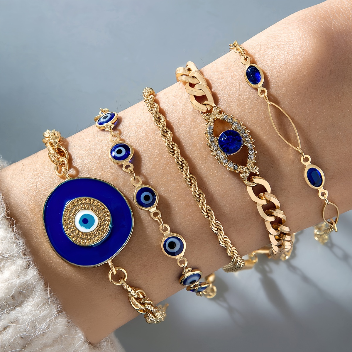 E-shop 5-teiliges Set modischer, kreativer Retro-Style mit Strass-Augen, individuelle Hip-Hop-Style blaue Öl-Tropfen-Dämonen-Augen-Flechten