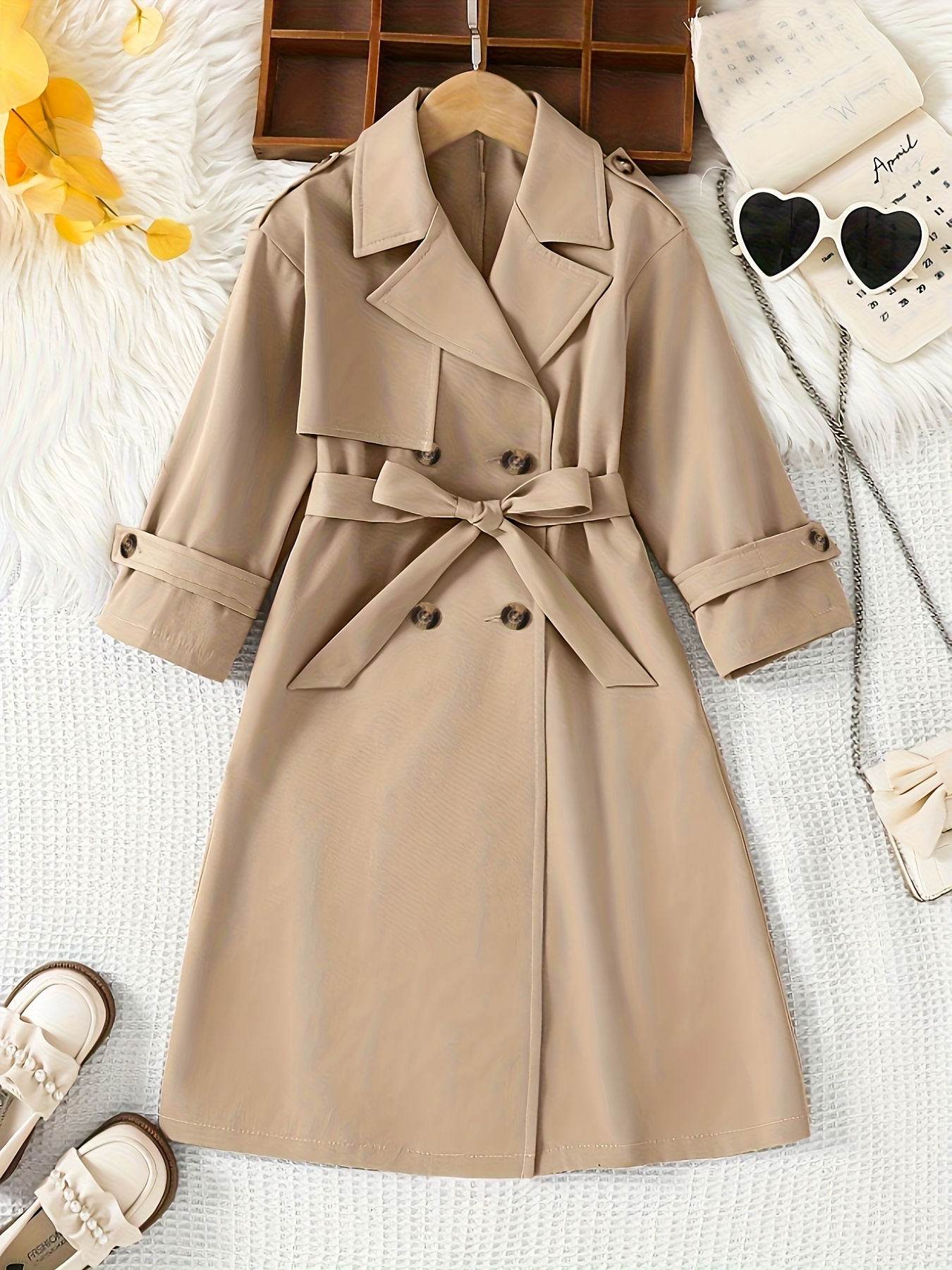 a stylish new autumn winter coat for girls featuring a fashionable double breasted design with a loose fit and a french style collar it   with a matching belt and is perfect for casual   parties and   outdoor activities Product details 0