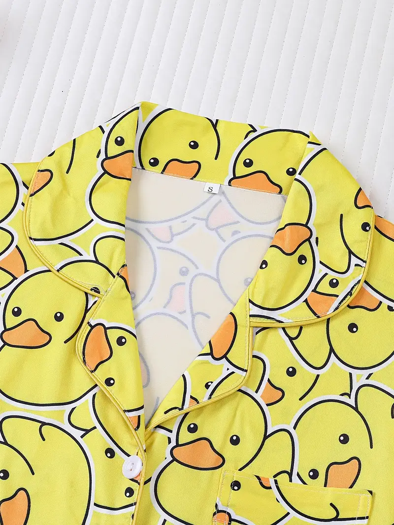 two piece womens yellow duck print pajamas set fabric comfortable all year round long sleeved button up top collar and matching pants with full body print and pocket details suitable for adult pajamas set Product details 2