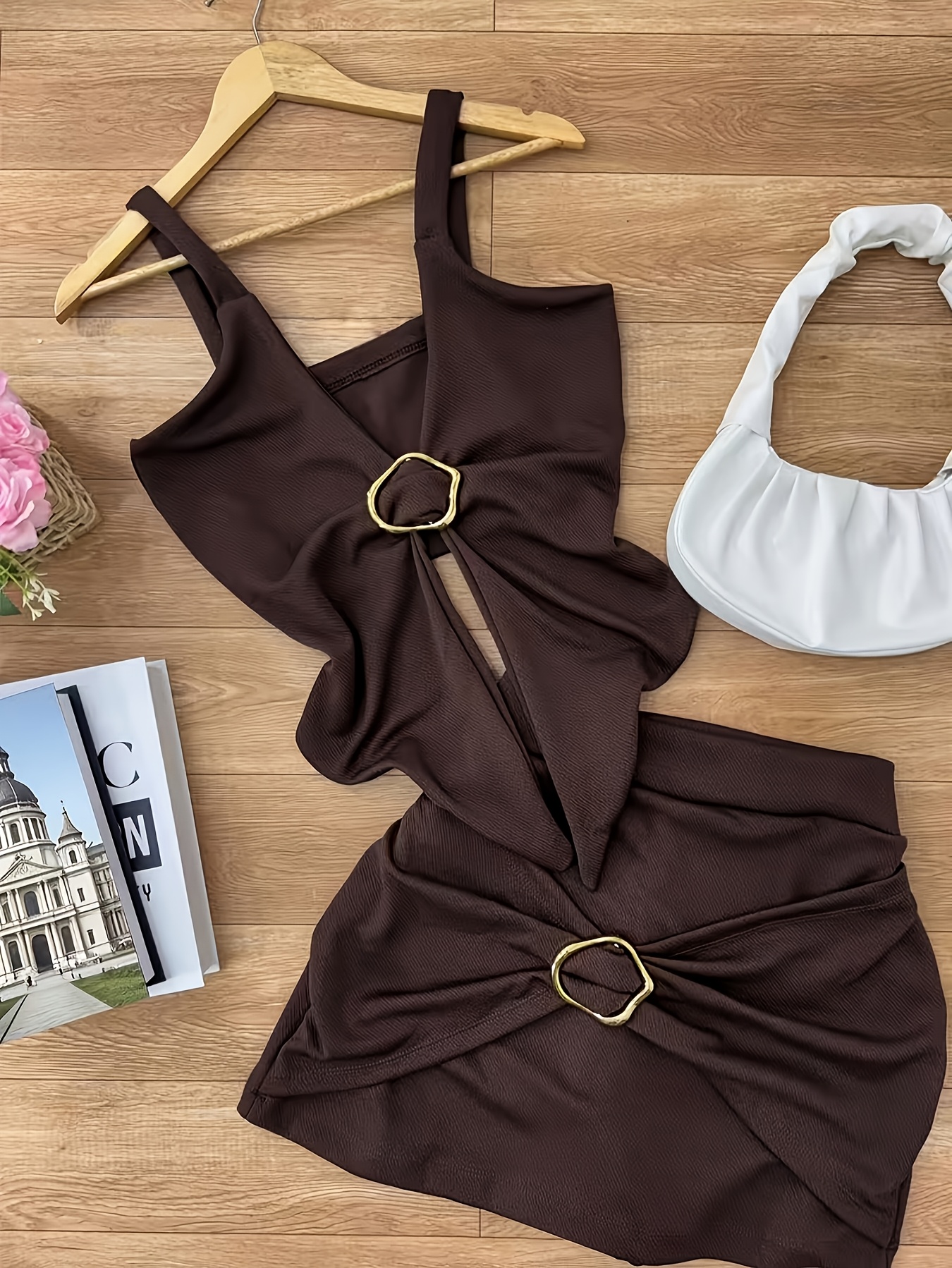 a stylish two piece set featuring a metallic accessory tank top and a high waisted fitted mini skirt   vacations dates social events valentines day and birthday parties