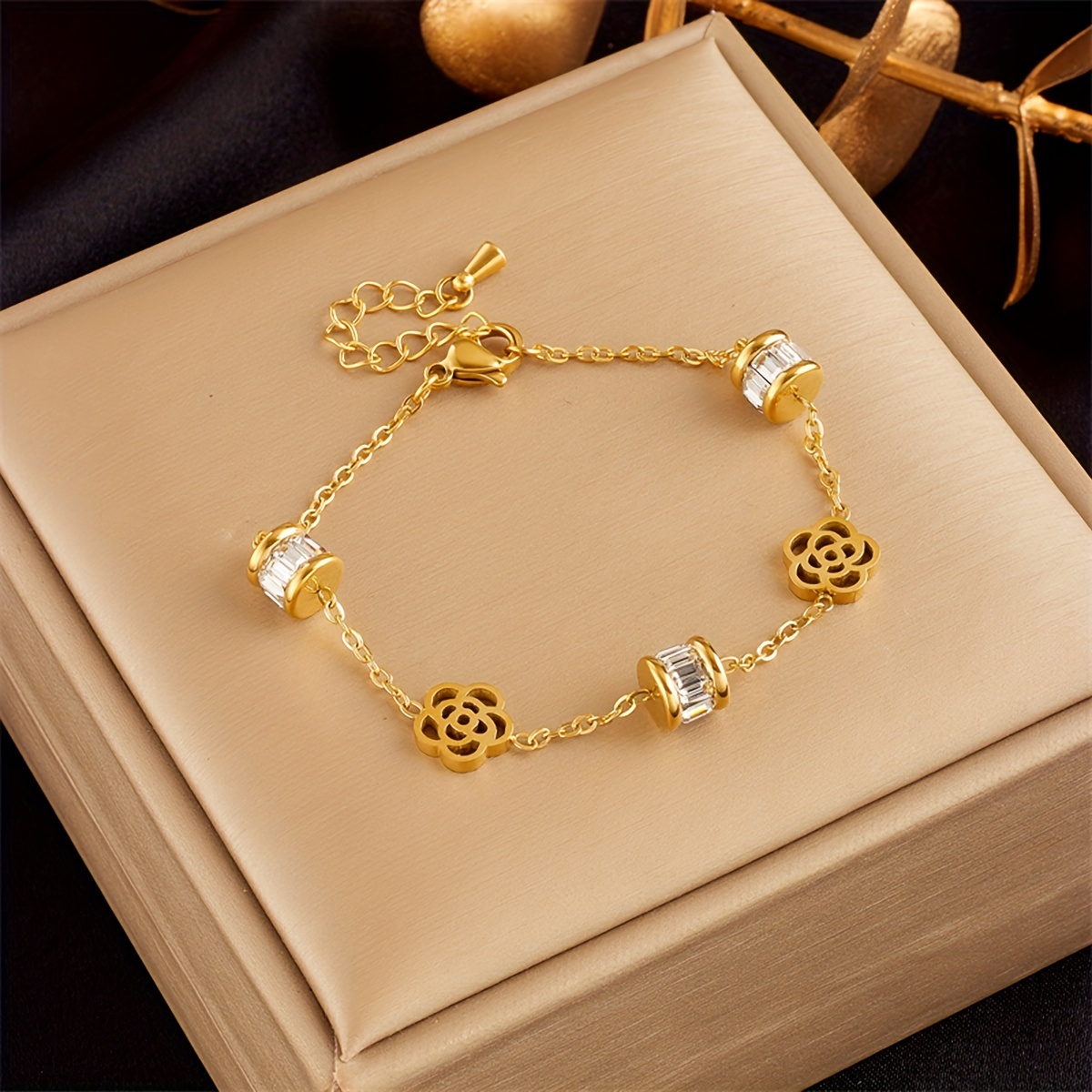 

Elegant Stainless Steel Gold-tone Bracelet With Hollow Flower Charms And Shimmering Accents, Adjustable Link Chain, Unisex Jewelry For Gifting And Banquets