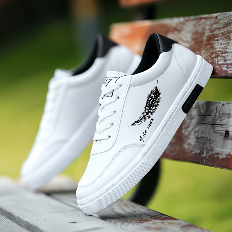 

Men's Trendy Solid White Shoes With Feather Pattern, Non Slip Lace Up Low Top Sneakers, Comfy For Outdoor Casual Activities Walking Jogging Traveling