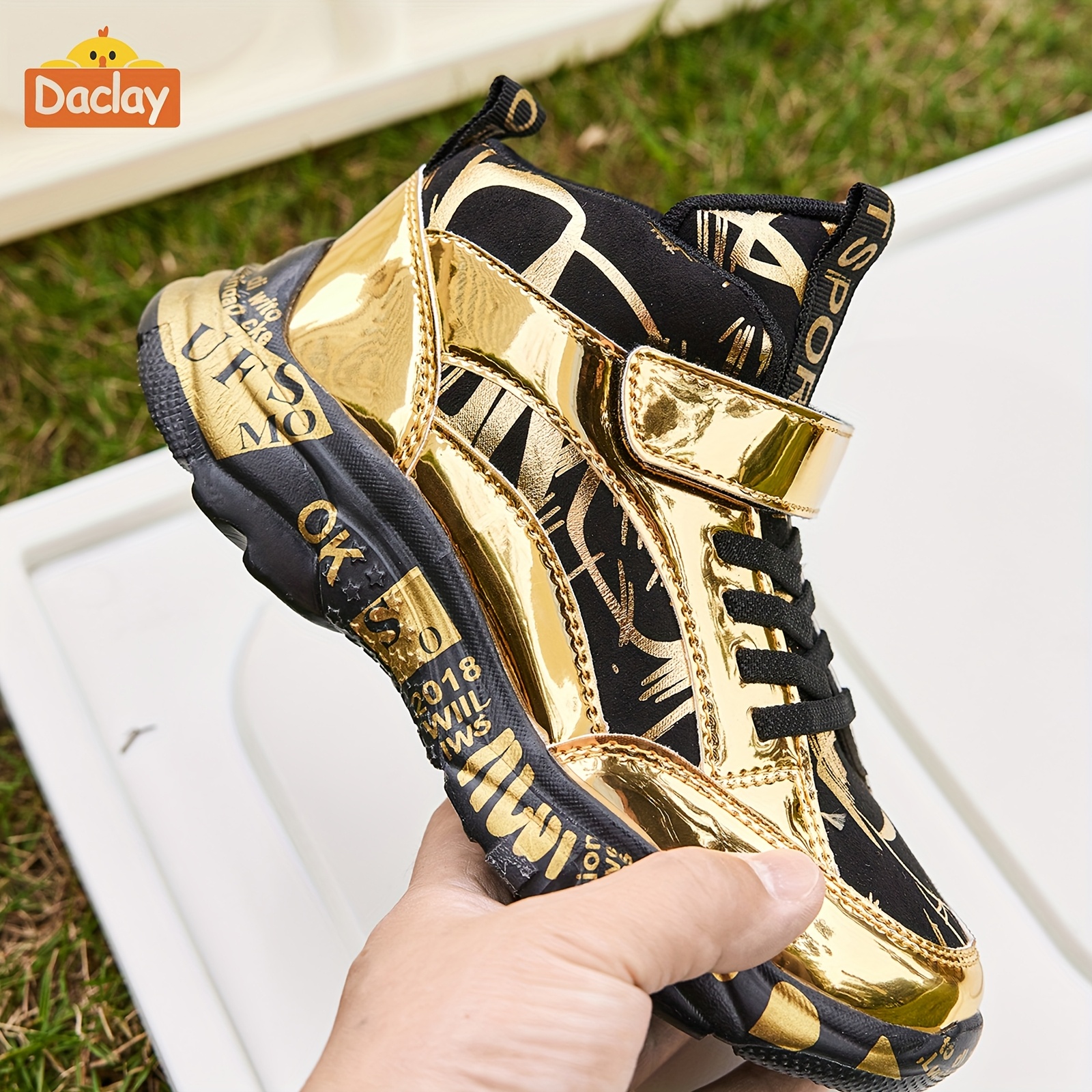 black and gold youth basketball shoes