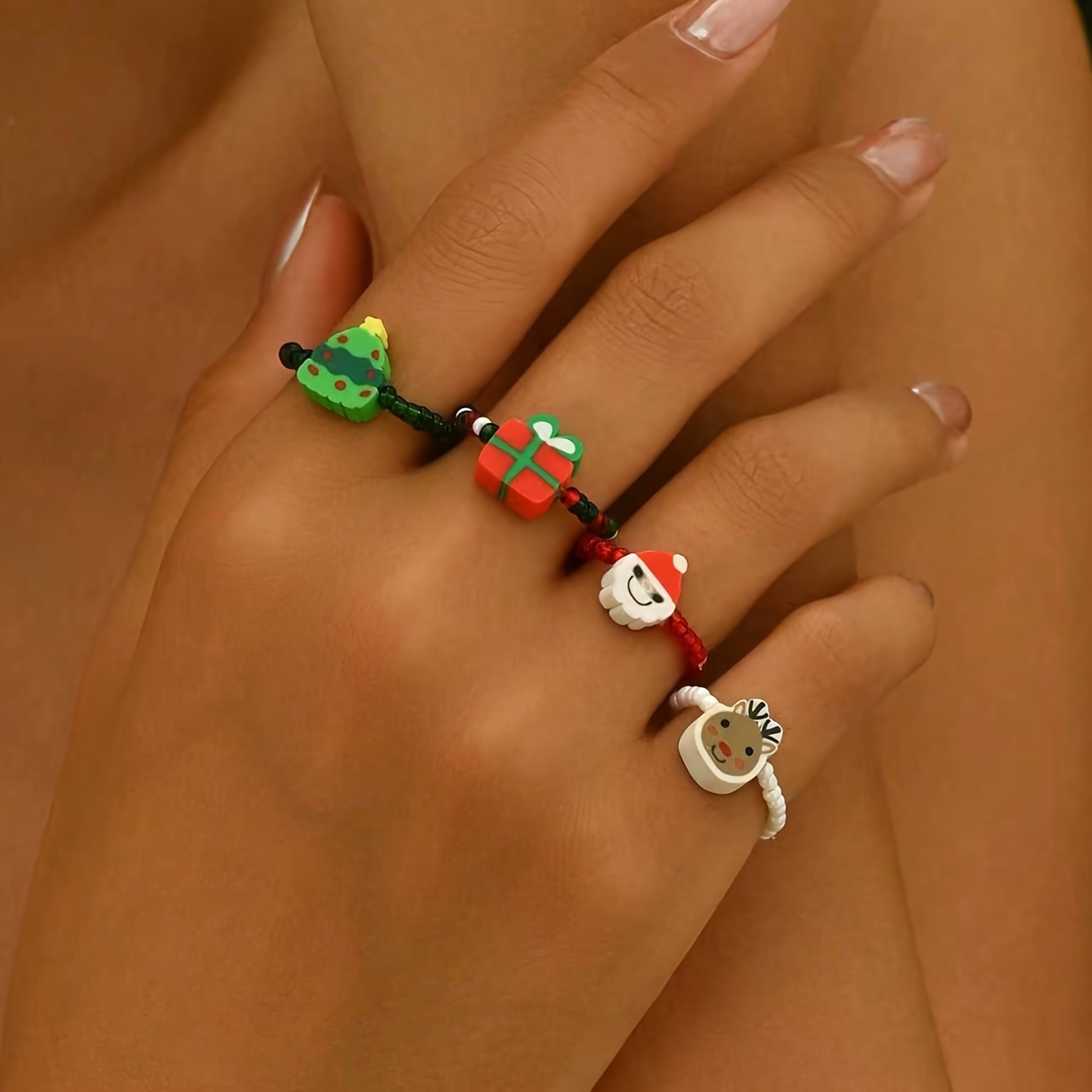 Image of 4pcs Autumn/winter Women's Fashion Personality Ring Set, Christmas Celebration Polymer Clay Santa Claus & Tree Reindeer Multi-element Combo Gift Handmade Beaded Elastic Rings In Random Colors