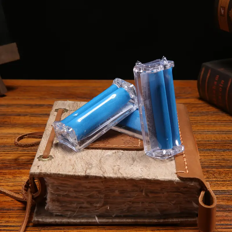 cloth cigarette A box of cigarettes sitting on top of a black cloth. PICRYL this cabana shirt doubles as a towel after a swim Man In Terrycloth Robe Smoking
