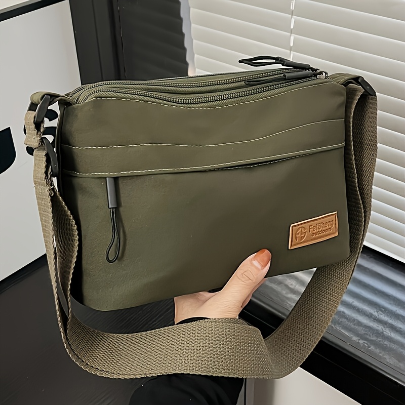 TEMU New Nylon Fabric Versatile Crossbody Bag With Multiple Pockets And Zippers, A Stylish And Casual Women's Shoulder Bag. Features An Adjustable