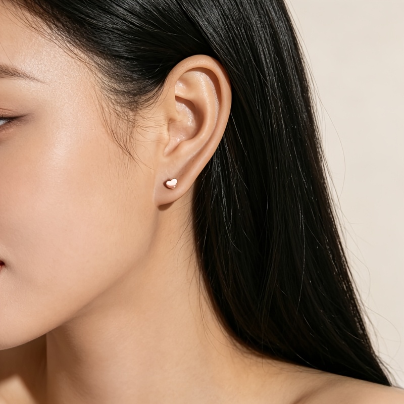 Women's Rose Gold Stainless Steel Heart Threaded Stud Earrings
